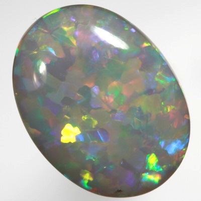SOLID SEMI BLACK OPAL Bright fire in a rare Jigsaw pattern SEE VIDEO